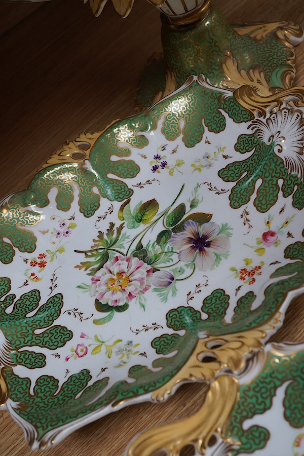 A circa 1835 part dessert set of floral and gilt decorated Rockingham style china, pattern number 6626, centrepiece 34cm wide. Condition - small comport cover cracked badly, some wear to gilding and pattern on plates